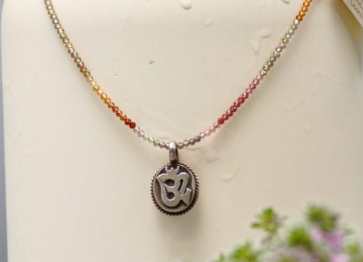 silver om pendant ~ faceted corundum necklace