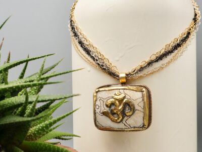 tibetan om amulet ~ naga shell necklace