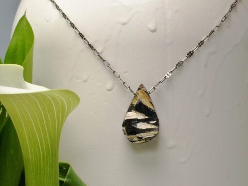 gold rutilated quartz ~ hematite amulet ~ oxidized silver chain necklace